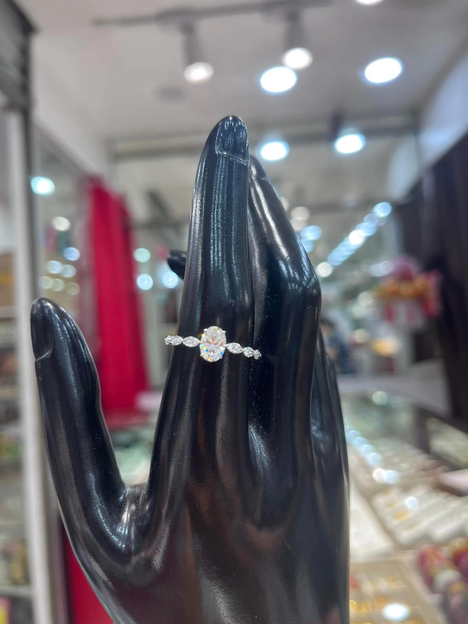 Oval Cut Moissanite Engagement Ring with Marquise Sides 18K Gold - Image 11