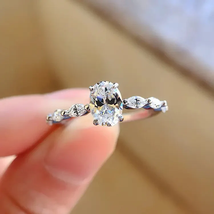 Oval Cut Moissanite Engagement Ring with Marquise Sides 18K Gold - Image 6